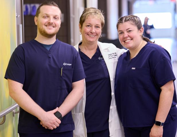 three nurses in hallway