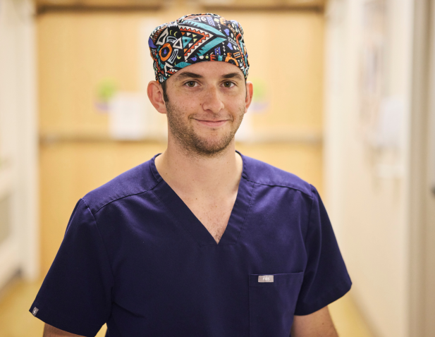Male nurse in blue scrubs