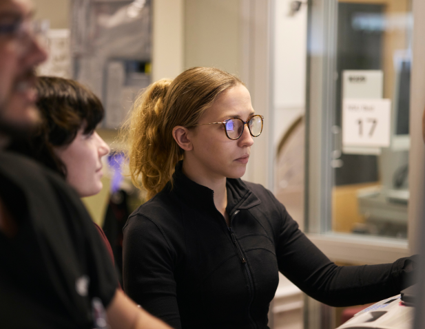 Nurse sitting at computer monitor