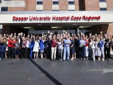 large group in front of Cooper University Hospital Cape Regional entrance
