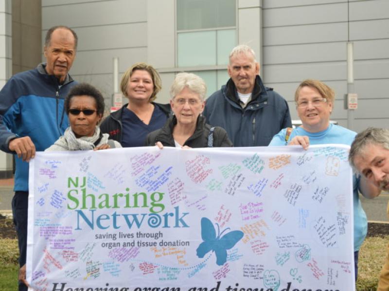 Cooper Commemorates Organ Donor Awareness Month With Flag Raising and Planting of Pinwheels