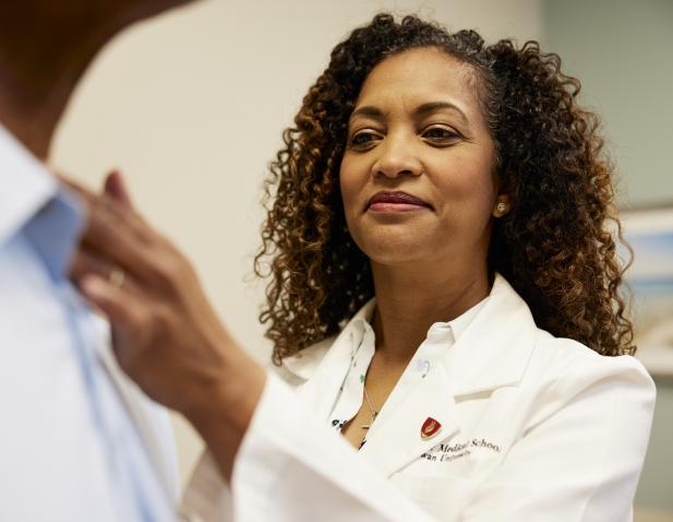 Dr. Reid performing an exam