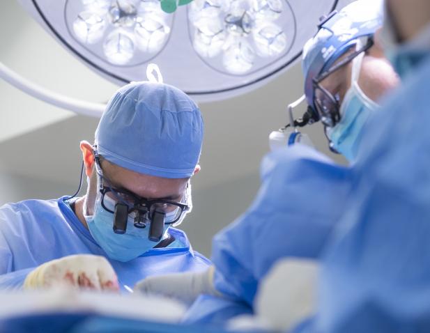 Dr. Fayed performing neurosurgery