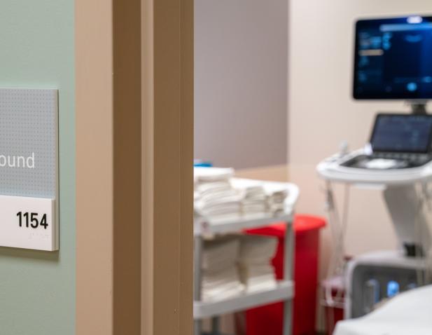 Ultrasound interior wall sign and machine Cherry Hill campus