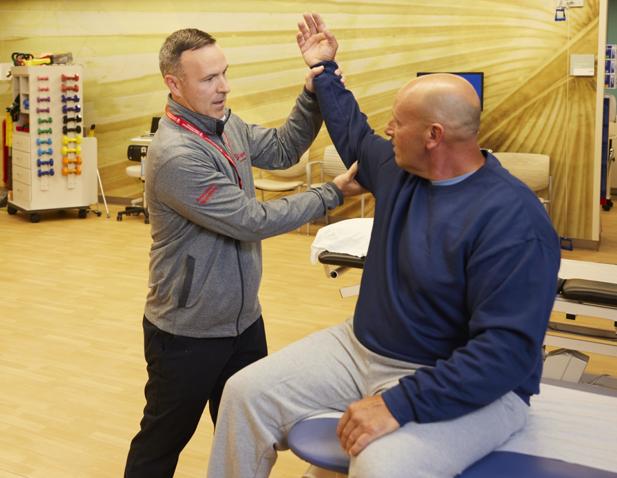 doctor patient arm shoulder