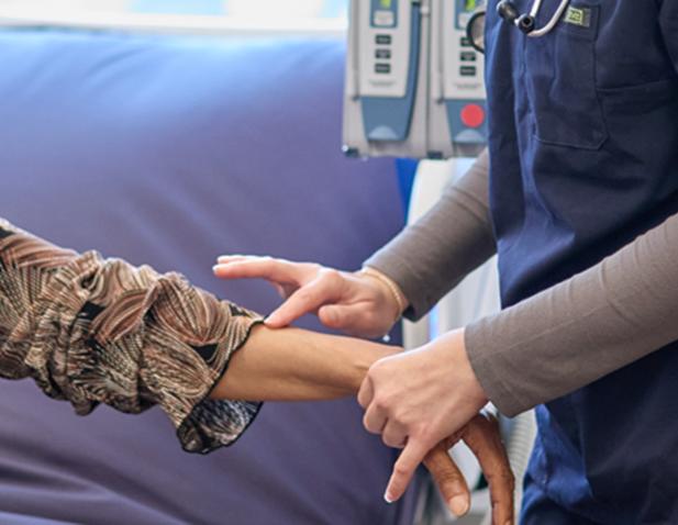 hand exam close up nurse patient