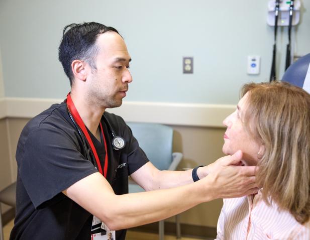 doctor female patient glands exam room