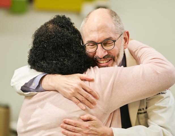 wharshal hugging patient