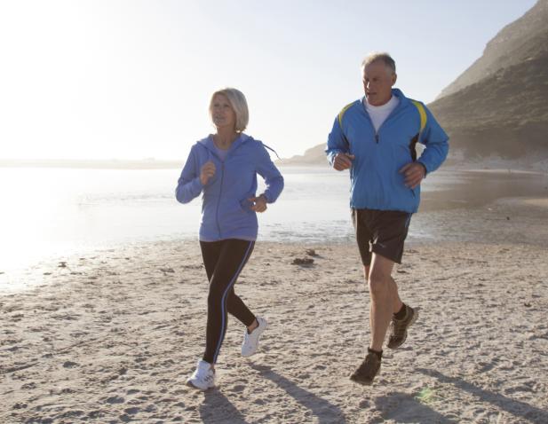Couple running on the beach
