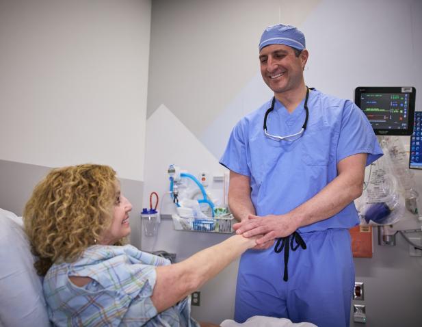 ortho surgeon with patient