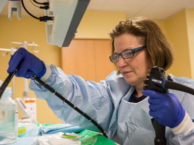 DHI nurse prepping for procedure