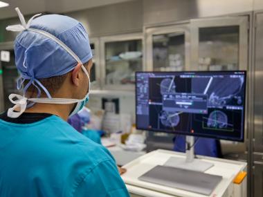 Dr. Fayed performing neurosurgery