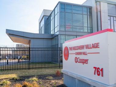 exterior photo of Recovery Village Cherry Hill at Cooper with sign