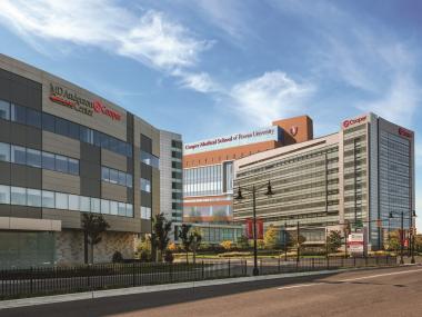 Picture of three Camden Campus buildings - Cooper University Hospital, Cooper Medical School of Rowan University, and MD Anderson Cancer Center at Cooper