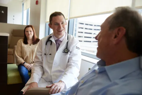 Dr. Jamin Morrison with a patient