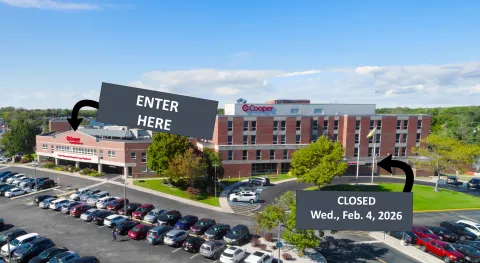 An aerial view of the Cooper University Hospital Cape Regional entrance, with indications of the temporary East lobby closure and alternative South entrance.