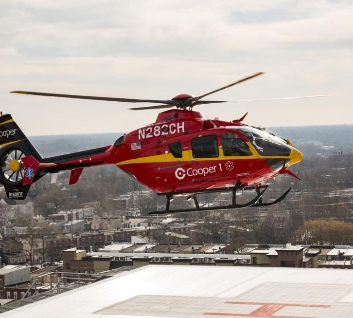 Cooper 1 helicopter landing on Kelemen roof